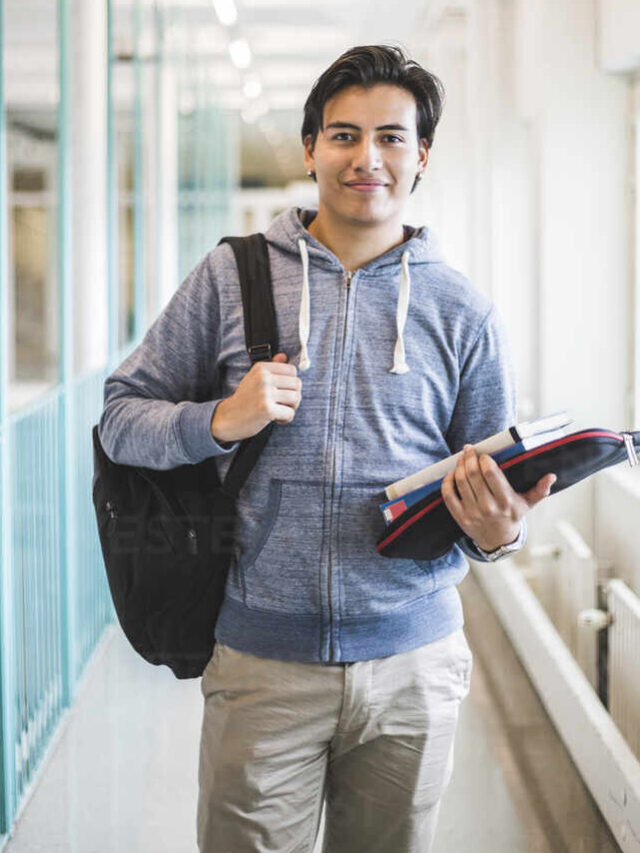 cropped-portrait-of-smiling-male-student-in-corridor-of-university-MASF19099.jpg